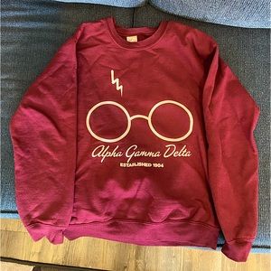 Small maroon Gildan Alpha Gamma Delta sweatshirt